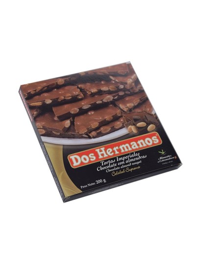 Auténtico turrón de chocolate con almendras presentado en una fina torta imperial con sabor tradicional. 250g